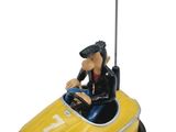 a close up of a figurine of a man in a yellow car