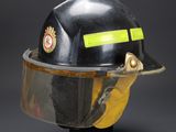 fireman ' s helmet with reflective vise and reflective face shield