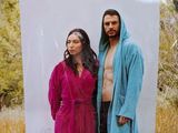 a picture of a man and a woman in a bathrobe