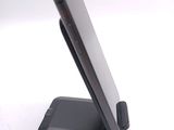 a cell phone that is sitting on top of a stand