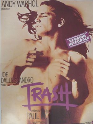 l'affiche du film « Trash », mettant en scène un homme aux cheveux longs et portant des lunettes