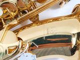a close up of a saxophone with a price tag on it