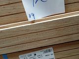 a piece of wood that has a price tag on it