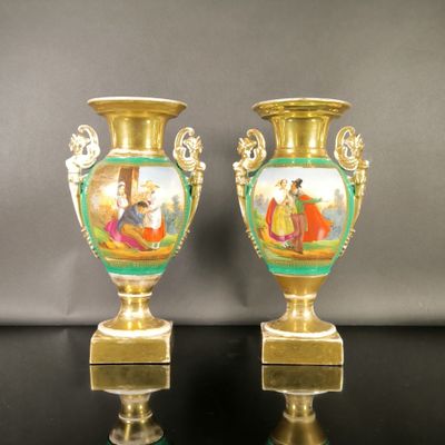 pair of antique gold vases with hand painted scenes on them