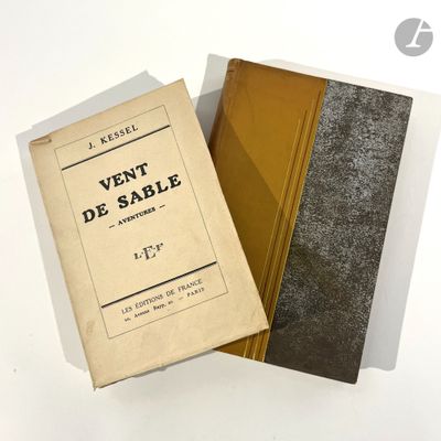 two books sitting next to each other on a table