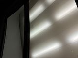 a picture of a window with light coming through it