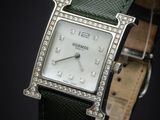 an image of a close up of a watch on a black background