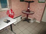 an image of a room with a table and a chair