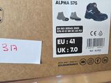 two boxes of shoes on the shelf in the store