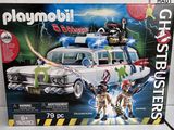 a box of playmobil ghostbusters with a ghostbuster