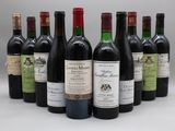 plusieurs bouteilles de vin sont alignées sur une table