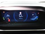 a car dashboard with a digital display on it