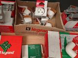 a box of assorted electrical items on a table