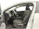 the interior of a car with the door open and the driver ' s seat down