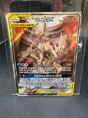 a close up of a pokemon card in a clear box