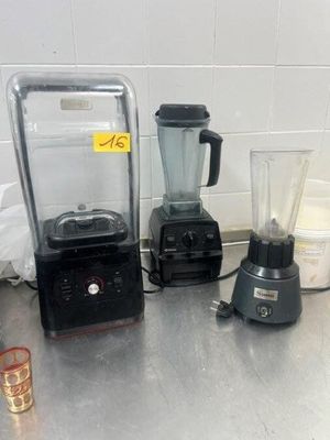 a blender and a blender sitting on a kitchen counter