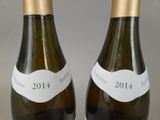 two bottles of wine that have labels on them