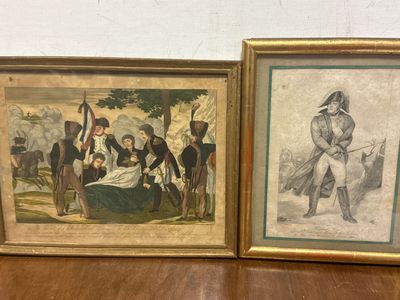 deux photos encadrées d'un homme et d'une femme sur une table
