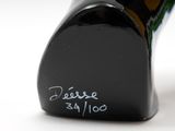 a close up of a black shoe with writing on it