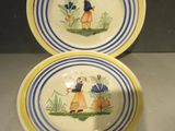 pair of yellow and blue plates with a girl and a dog