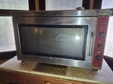 a microwave that is sitting on top of a table