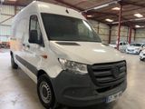 a white van that is parked in a garage