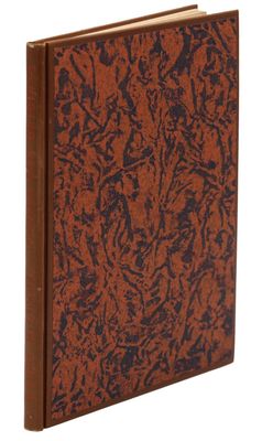 a brown and black book with a brown cover on a white background