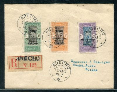 four different stamps on the back of a postcard