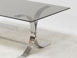 an image of a glass and chrome coffee table