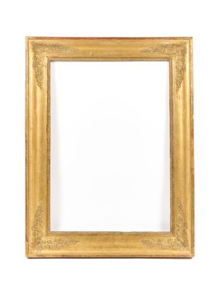 a gold frame with a white background and a red border