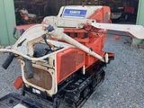 a small machine that is sitting in a garage