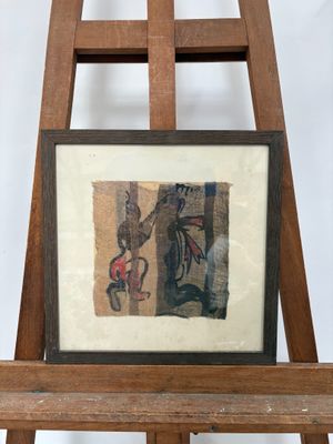 peinture sur un chevalet devant un fond blanc