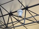 a light that is hanging from the ceiling of a building