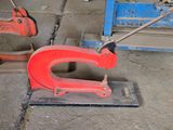 a red object that is sitting on the ground
