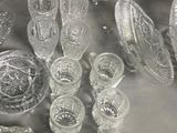 a lot of glass items that are on the table