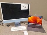 a laptop and a laptop computer sitting on a desk