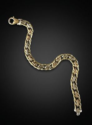 an image of a gold chain on a black background