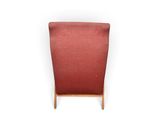 a red chair with a wooden frame on a white background
