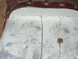 a close up of a piece of luggage sitting on the floor