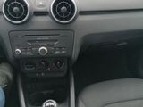 a dashboard of a car with a steering control in it