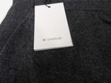 the label is attached to a sweater that says be unhilled