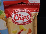 a bag of chips sitting next to a package of chips