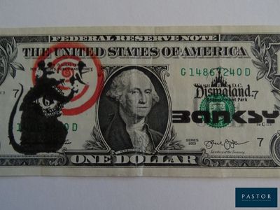 une image d'un billet d'un dollar sur lequel figure un rat