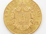 an image of a gold coin with a coat of arms on it