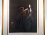 painting of a man and a woman standing next to each other on a easel