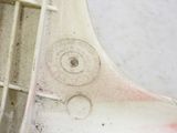a close up of a dirty sink with a drain in it