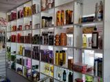many shelves of food and condiments in this store
