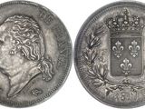 gros plan d'une pièce de monnaie surmontée d'une couronne