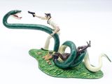 a figurine of a man on a snake with a gun