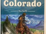 a book with a picture of a man riding a horse